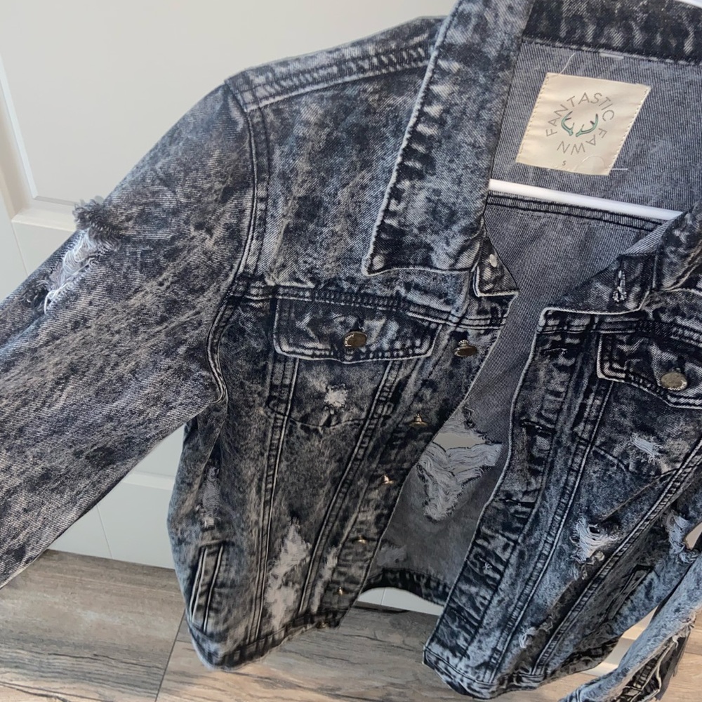 Faded black denim jacket.